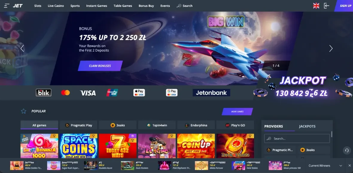 Zrzut ekranu polskiej wersji Jet Casino (nr 5 w rankingu Kaszinok24): baner Bonus 175% up to 2 250 zl Your Rewards on the First 2 Deposits z przyciskiem CLAIM BONUSES, grafika mysliwca odrzutowego na tle kosmosu i planet oraz napis BIG WIN, po prawej stronie Jackpot 130 842 926 zl, licznik ofert 1/4, logo JET w lewym gornym rogu z menu Slots, Live Casino, Sports, Instant Games, Table Games, Bonus Buy, Events i Search, pasek platnosci BLIK, Mastercard, VISA, UnionPay, Apple Pay, G Pay i Jetonbank, sekcja POPULAR z kafelkami Sweet Bonanza 1000, Space Coins, 7 Lucky 432 Ways, Le Bandit i Coin Up Hot Fire 3x3, na dole wstazka Current Winners z wygranymi (zrzut redakcyjny, 2026).